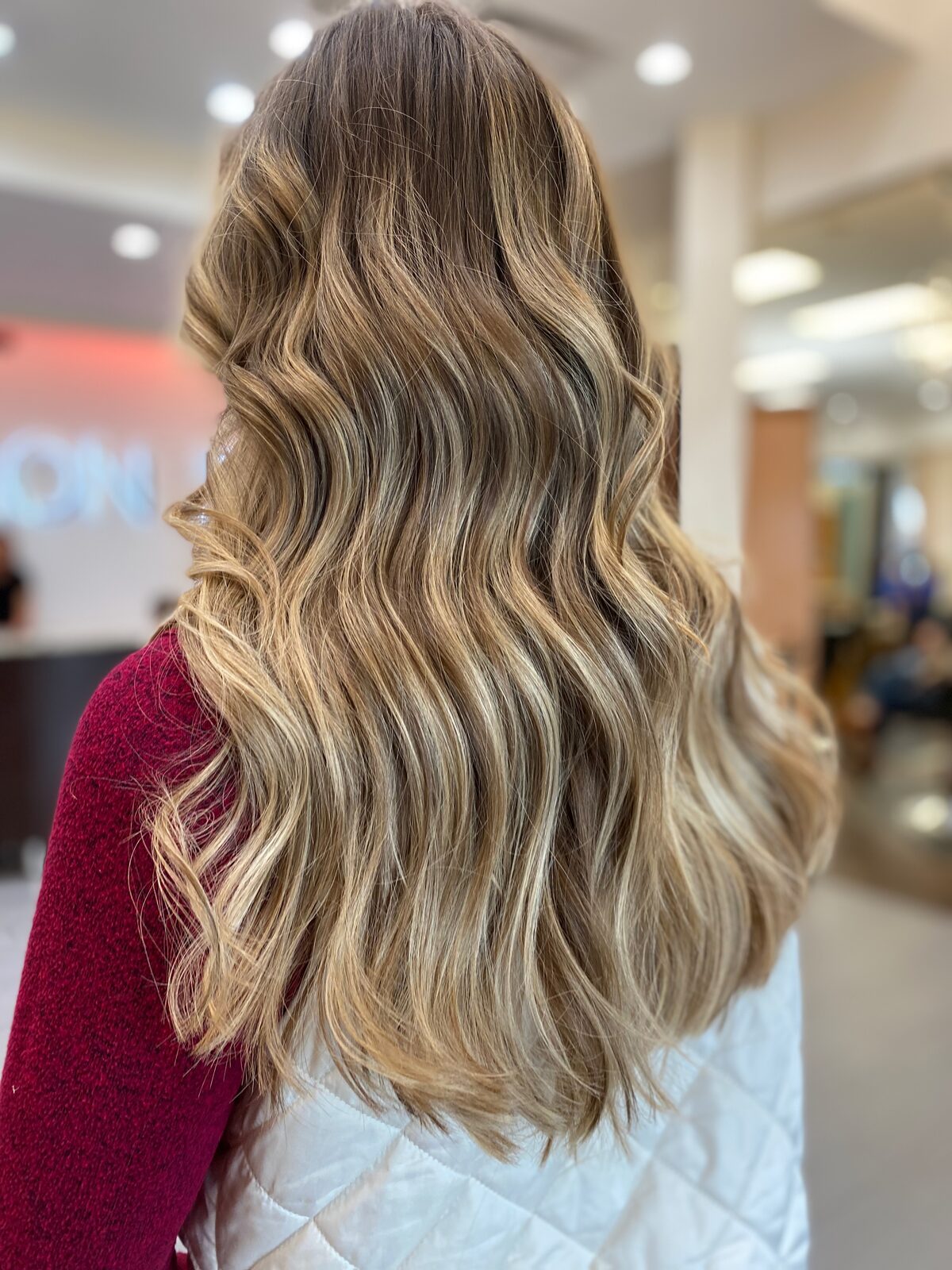 Austin hair extensions blended with dimensional blonde color